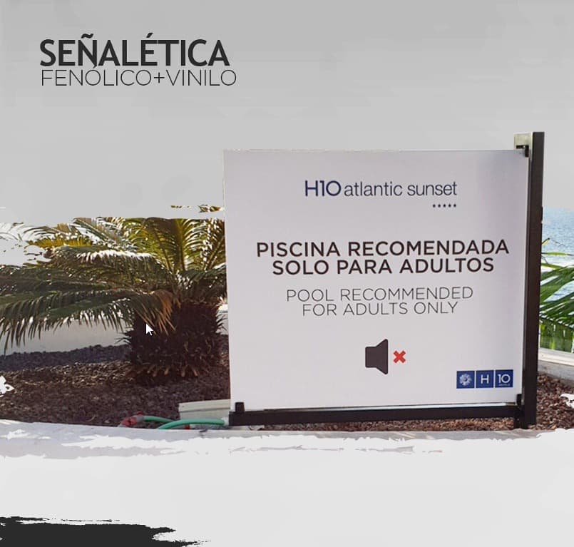 Composición gráfica de la señalética en fenólico y vinilo diseñada para H10